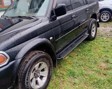 Чорний Міцубісі Паджеро Спорт, об'ємом двигуна 2.97 л та пробігом 230 тис. км за 9500 $, фото 11 на Automoto.ua