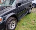 Чорний Міцубісі Паджеро Спорт, об'ємом двигуна 2.97 л та пробігом 230 тис. км за 9500 $, фото 11 на Automoto.ua