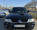 Черный Мицубиси Паджеро Спорт, объемом двигателя 2.48 л и пробегом 163 тыс. км за 10500 $, фото 1 на Automoto.ua