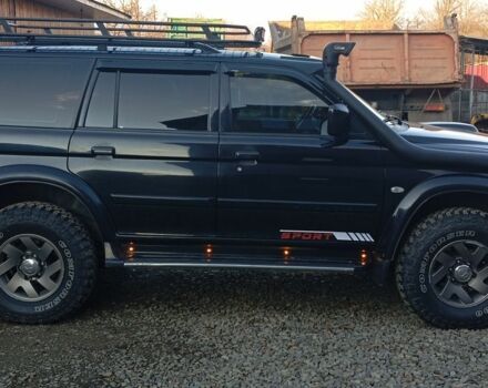 Чорний Міцубісі Паджеро Спорт, об'ємом двигуна 2.5 л та пробігом 279 тис. км за 13000 $, фото 2 на Automoto.ua