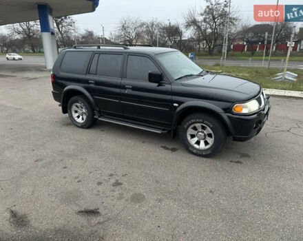 Черный Мицубиси Паджеро Спорт, объемом двигателя 3 л и пробегом 240 тыс. км за 8500 $, фото 2 на Automoto.ua