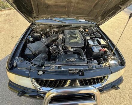 Черный Мицубиси Паджеро Спорт, объемом двигателя 3 л и пробегом 280 тыс. км за 9800 $, фото 21 на Automoto.ua