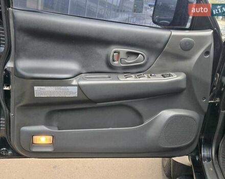 Чорний Міцубісі Паджеро Спорт, об'ємом двигуна 2.5 л та пробігом 345 тис. км за 9900 $, фото 13 на Automoto.ua