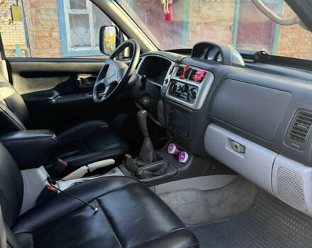 Чорний Міцубісі Паджеро Спорт, об'ємом двигуна 2.5 л та пробігом 330 тис. км за 7000 $, фото 6 на Automoto.ua