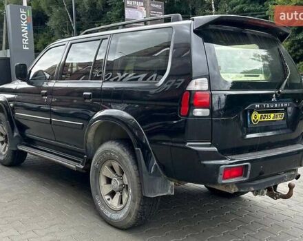 Чорний Міцубісі Паджеро Спорт, об'ємом двигуна 2.97 л та пробігом 390 тис. км за 5900 $, фото 3 на Automoto.ua