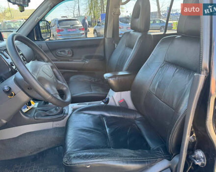 Чорний Міцубісі Паджеро Спорт, об'ємом двигуна 3 л та пробігом 195 тис. км за 8500 $, фото 6 на Automoto.ua