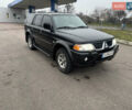 Черный Мицубиси Паджеро Спорт, объемом двигателя 3 л и пробегом 240 тыс. км за 8500 $, фото 1 на Automoto.ua
