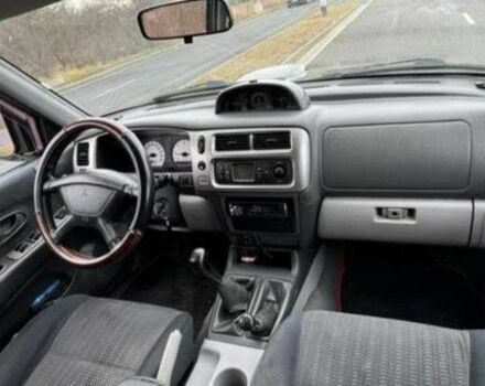 Чорний Міцубісі Паджеро Спорт, об'ємом двигуна 2.5 л та пробігом 248 тис. км за 4100 $, фото 6 на Automoto.ua