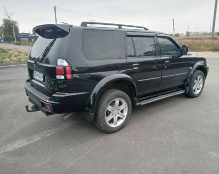 Чорний Міцубісі Паджеро Спорт, об'ємом двигуна 3 л та пробігом 200 тис. км за 8300 $, фото 3 на Automoto.ua