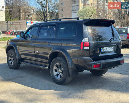 Чорний Міцубісі Паджеро Спорт, об'ємом двигуна 3 л та пробігом 195 тис. км за 8500 $, фото 2 на Automoto.ua