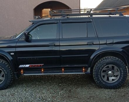 Чорний Міцубісі Паджеро Спорт, об'ємом двигуна 2.5 л та пробігом 279 тис. км за 13000 $, фото 1 на Automoto.ua