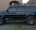 Чорний Міцубісі Паджеро Спорт, об'ємом двигуна 2.5 л та пробігом 279 тис. км за 13000 $, фото 1 на Automoto.ua