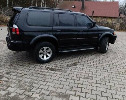 Чорний Міцубісі Паджеро Спорт, об'ємом двигуна 3 л та пробігом 238 тис. км за 8500 $, фото 1 на Automoto.ua