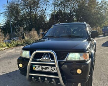 Черный Мицубиси Паджеро Спорт, объемом двигателя 3 л и пробегом 280 тыс. км за 9800 $, фото 1 на Automoto.ua