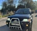 Черный Мицубиси Паджеро Спорт, объемом двигателя 3 л и пробегом 280 тыс. км за 9800 $, фото 1 на Automoto.ua