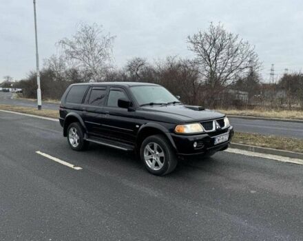 Чорний Міцубісі Паджеро Спорт, об'ємом двигуна 2.5 л та пробігом 248 тис. км за 4100 $, фото 1 на Automoto.ua