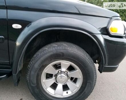 Черный Мицубиси Паджеро Спорт, объемом двигателя 2.5 л и пробегом 264 тыс. км за 11200 $, фото 8 на Automoto.ua