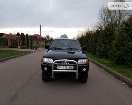 Черный Мицубиси Паджеро Спорт, объемом двигателя 2.5 л и пробегом 264 тыс. км за 11200 $, фото 2 на Automoto.ua