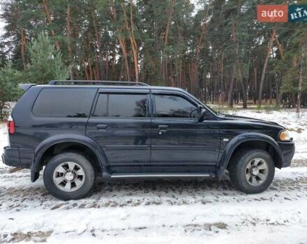 Чорний Міцубісі Паджеро Спорт, об'ємом двигуна 3 л та пробігом 190 тис. км за 9700 $, фото 2 на Automoto.ua