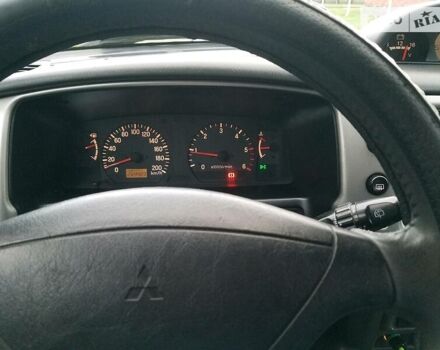 Черный Мицубиси Паджеро Спорт, объемом двигателя 2.5 л и пробегом 264 тыс. км за 11200 $, фото 16 на Automoto.ua