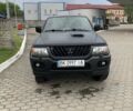 Черный Мицубиси Паджеро Спорт, объемом двигателя 2.5 л и пробегом 308 тыс. км за 9950 $, фото 2 на Automoto.ua