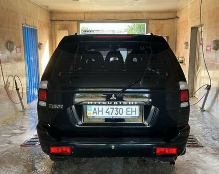 Черный Мицубиси Паджеро Спорт, объемом двигателя 3 л и пробегом 74 тыс. км за 15000 $, фото 4 на Automoto.ua