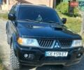 Черный Мицубиси Паджеро Спорт, объемом двигателя 2.48 л и пробегом 155 тыс. км за 11500 $, фото 1 на Automoto.ua