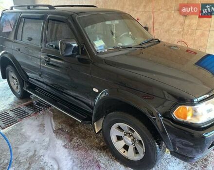 Черный Мицубиси Паджеро Спорт, объемом двигателя 3 л и пробегом 74 тыс. км за 15000 $, фото 1 на Automoto.ua