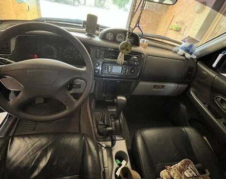 Черный Мицубиси Паджеро Спорт, объемом двигателя 3 л и пробегом 74 тыс. км за 15000 $, фото 2 на Automoto.ua