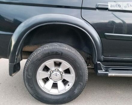 Черный Мицубиси Паджеро Спорт, объемом двигателя 2.5 л и пробегом 264 тыс. км за 11200 $, фото 7 на Automoto.ua