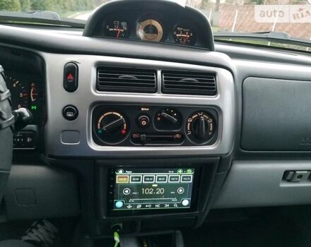 Черный Мицубиси Паджеро Спорт, объемом двигателя 2.5 л и пробегом 264 тыс. км за 11200 $, фото 15 на Automoto.ua