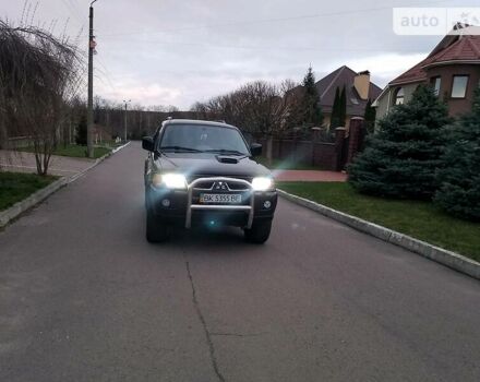 Черный Мицубиси Паджеро Спорт, объемом двигателя 2.5 л и пробегом 264 тыс. км за 11200 $, фото 1 на Automoto.ua
