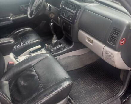 Черный Мицубиси Паджеро Спорт, объемом двигателя 3 л и пробегом 213 тыс. км за 8500 $, фото 7 на Automoto.ua