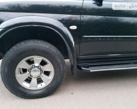 Черный Мицубиси Паджеро Спорт, объемом двигателя 2.5 л и пробегом 264 тыс. км за 11200 $, фото 5 на Automoto.ua