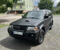 Черный Мицубиси Паджеро Спорт, объемом двигателя 2.5 л и пробегом 308 тыс. км за 9950 $, фото 1 на Automoto.ua