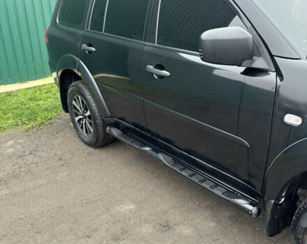 Черный Мицубиси Паджеро Спорт, объемом двигателя 2.5 л и пробегом 316 тыс. км за 10400 $, фото 5 на Automoto.ua