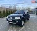 Чорний Міцубісі Паджеро Спорт, об'ємом двигуна 2.48 л та пробігом 245 тис. км за 12500 $, фото 1 на Automoto.ua