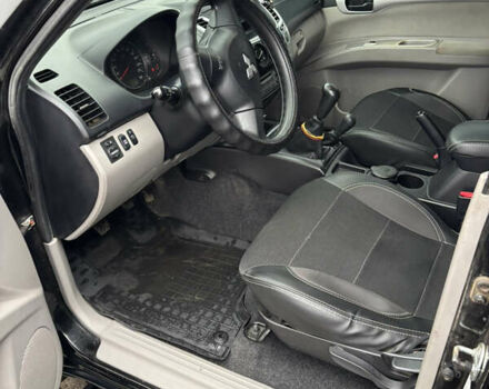 Черный Мицубиси Паджеро Спорт, объемом двигателя 2.5 л и пробегом 316 тыс. км за 10400 $, фото 12 на Automoto.ua