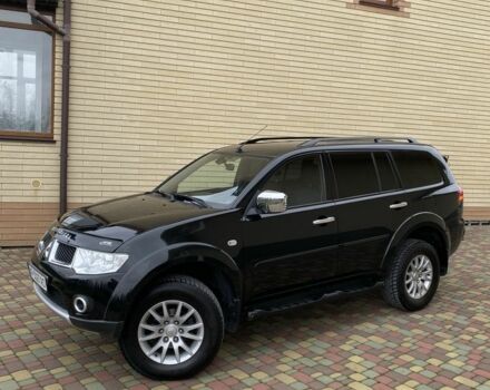 Черный Мицубиси Паджеро Спорт, объемом двигателя 2.5 л и пробегом 154 тыс. км за 13850 $, фото 1 на Automoto.ua
