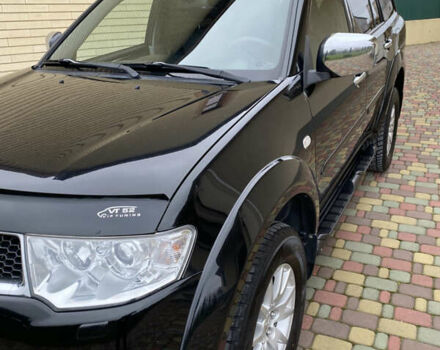 Черный Мицубиси Паджеро Спорт, объемом двигателя 2.5 л и пробегом 154 тыс. км за 13850 $, фото 25 на Automoto.ua