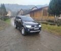 Черный Мицубиси Паджеро Спорт, объемом двигателя 2.5 л и пробегом 240 тыс. км за 12650 $, фото 1 на Automoto.ua
