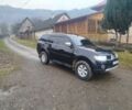 Черный Мицубиси Паджеро Спорт, объемом двигателя 2.5 л и пробегом 240 тыс. км за 12650 $, фото 1 на Automoto.ua
