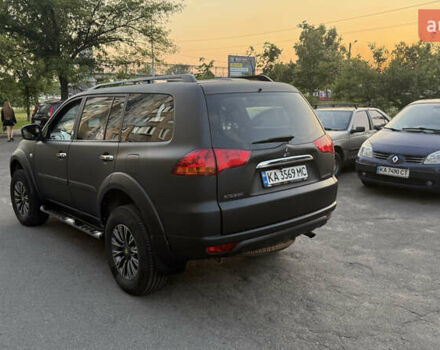 Чорний Міцубісі Паджеро Спорт, об'ємом двигуна 2.48 л та пробігом 244 тис. км за 15000 $, фото 9 на Automoto.ua