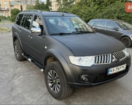 Чорний Міцубісі Паджеро Спорт, об'ємом двигуна 2.5 л та пробігом 250 тис. км за 14000 $, фото 1 на Automoto.ua
