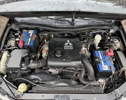 Черный Мицубиси Паджеро Спорт, объемом двигателя 2.5 л и пробегом 219 тыс. км за 12200 $, фото 10 на Automoto.ua