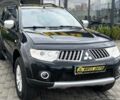 Чорний Міцубісі Паджеро Спорт, об'ємом двигуна 2.5 л та пробігом 296 тис. км за 12220 $, фото 1 на Automoto.ua