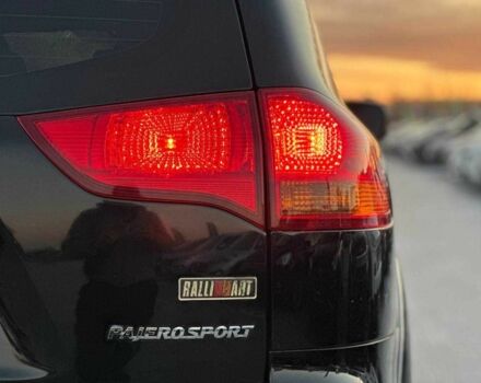 Чорний Міцубісі Паджеро Спорт, об'ємом двигуна 2.5 л та пробігом 197 тис. км за 12990 $, фото 7 на Automoto.ua