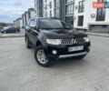 Черный Мицубиси Паджеро Спорт, объемом двигателя 2.48 л и пробегом 221 тыс. км за 15000 $, фото 1 на Automoto.ua