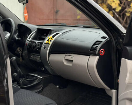 Черный Мицубиси Паджеро Спорт, объемом двигателя 2.5 л и пробегом 219 тыс. км за 12200 $, фото 44 на Automoto.ua