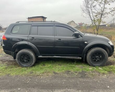 Черный Мицубиси Паджеро Спорт, объемом двигателя 2.5 л и пробегом 199 тыс. км за 10000 $, фото 1 на Automoto.ua